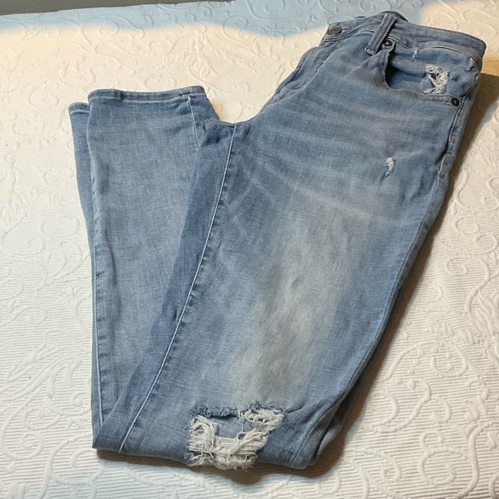 AEO Light Blue Slim Taper Jeans. Distressed with holes. 30x36